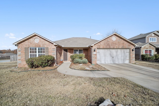 single story home with a garage