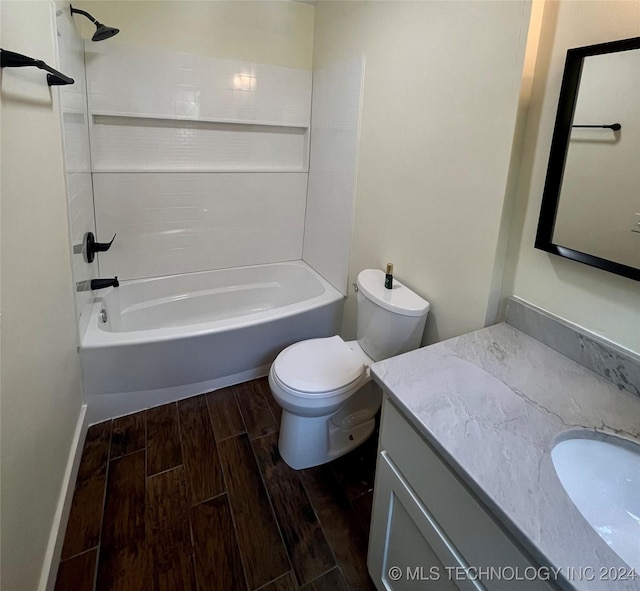 full bathroom with hardwood / wood-style floors, vanity, toilet, and bathing tub / shower combination