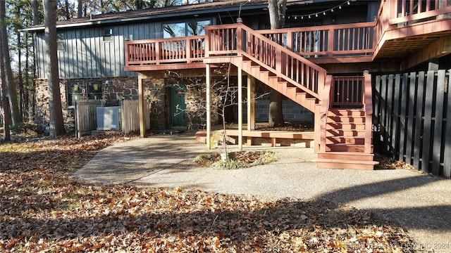 back of property featuring a deck