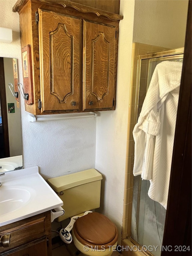 10722 E First St, Claremore, OK 74019 - full bath with a stall shower, vanity, and toilet