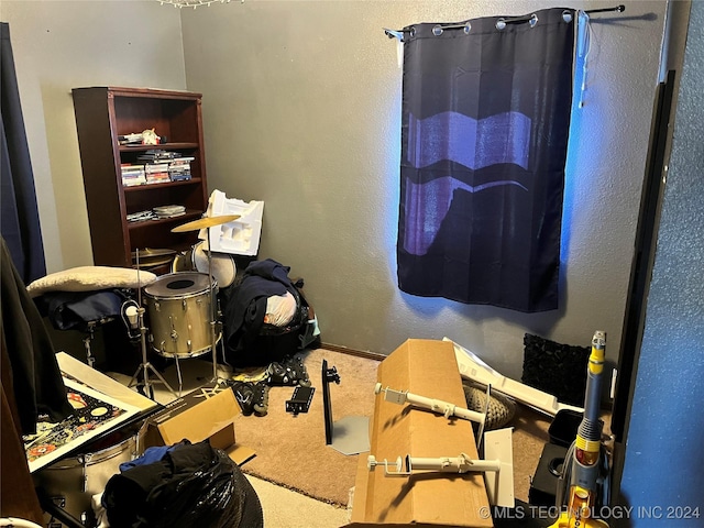 10722 E First St, Claremore, OK 74019 - miscellaneous room featuring carpet floors