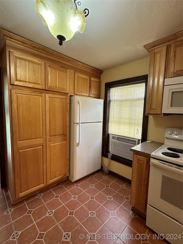 kitchen featuring white appliances and cooling unit