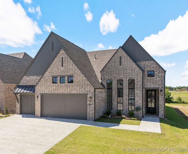 2601 W Twin Oaks St, Broken Arrow, OK 74012 - view of front of house featuring board and batten siding, driveway, a front yard, brick siding, and a shingled roof