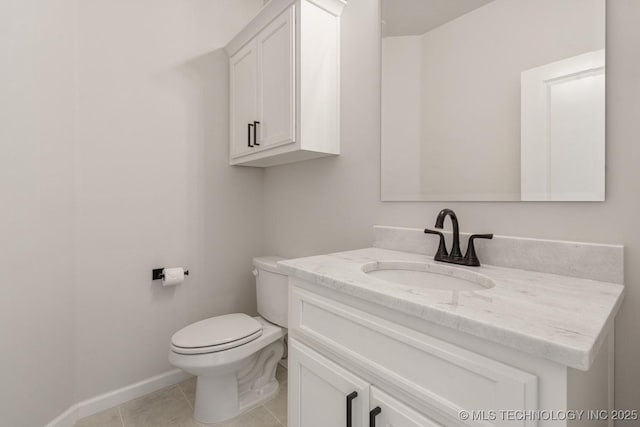 2601 W Twin Oaks St, Broken Arrow, OK 74012 - bathroom featuring vanity, toilet, tile patterned floors, and baseboards