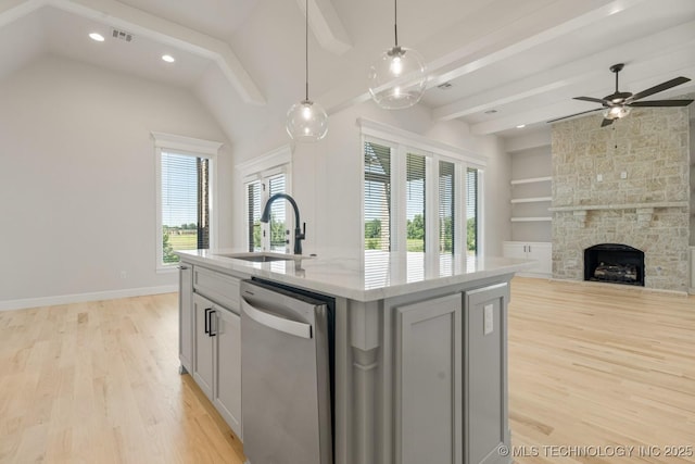 2601 W Twin Oaks St, Broken Arrow, OK 74012 - kitchen featuring dishwasher, a sink, light wood-style flooring, open floor plan, and recessed lighting
