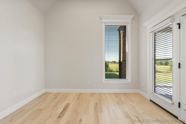 2601 W Twin Oaks St, Broken Arrow, OK 74012 - empty room featuring lofted ceiling, light wood-style floors, and baseboards