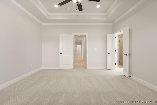2601 W Twin Oaks St, Broken Arrow, OK 74012 - unfurnished bedroom featuring a tray ceiling, light carpet, crown molding, baseboards, and recessed lighting