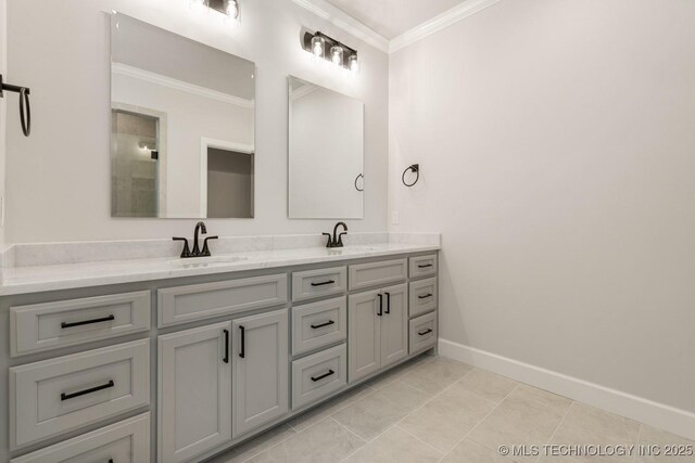 2601 W Twin Oaks St, Broken Arrow, OK 74012 - bathroom with ornamental molding, double vanity, and baseboards