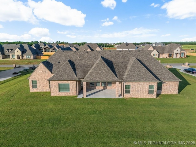 17413 S 52nd E Ave, Bixby, OK 74008 - view of front facade featuring a patio area, brick siding, a shingled roof, and a residential view
