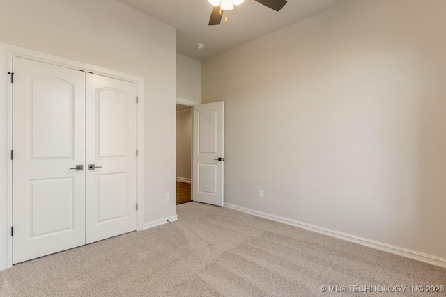 17413 S 52nd E Ave, Bixby, OK 74008 - unfurnished bedroom with carpet flooring, baseboards, a closet, and a ceiling fan