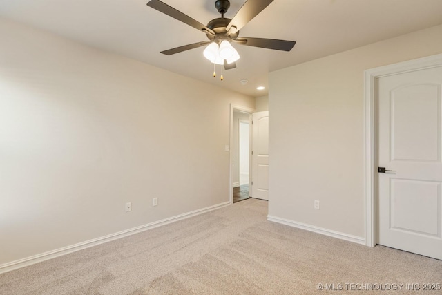 17413 S 52nd E Ave, Bixby, OK 74008 - unfurnished bedroom featuring light colored carpet, baseboards, and ceiling fan