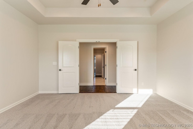 17413 S 52nd E Ave, Bixby, OK 74008 - empty room featuring carpet floors, a raised ceiling, ceiling fan, and baseboards