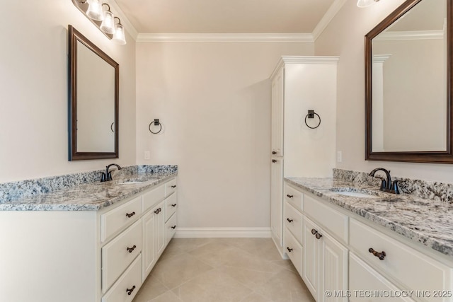 17413 S 52nd E Ave, Bixby, OK 74008 - bathroom with two vanities, ornamental molding, and baseboards