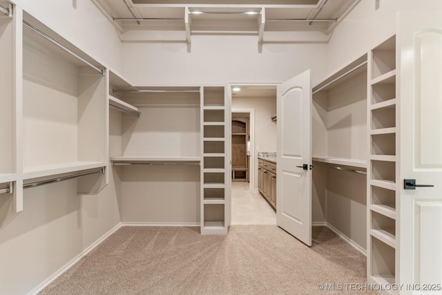 17413 S 52nd E Ave, Bixby, OK 74008 - walk in closet featuring light colored carpet