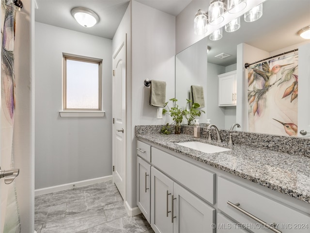 bathroom featuring vanity