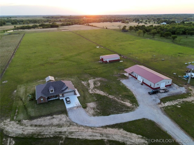 aerial view at dusk with a rural view