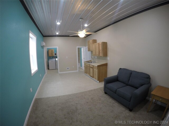 unfurnished living room featuring ceiling fan, wood ceiling, sink, and light carpet