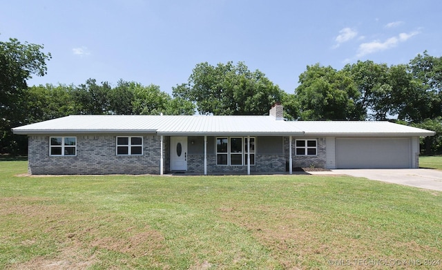 ranch-style house with a front yard, a porch, and a garage