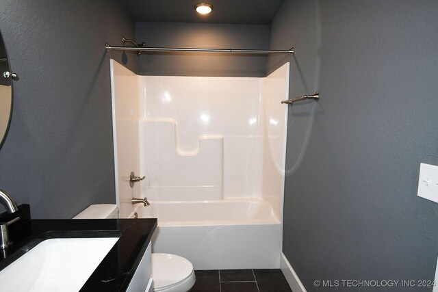 full bathroom featuring tile patterned flooring, vanity, toilet, and tub / shower combination