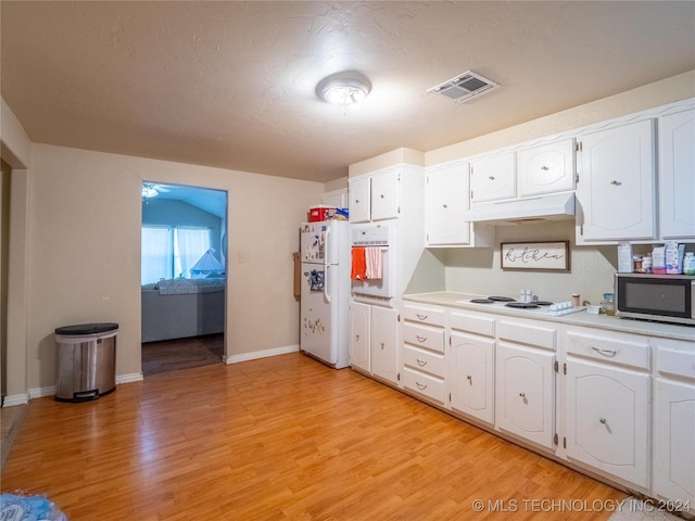 kitchen featuring a textured ceiling, white appliances, light hardwood / wood-style floors, and white cabinetry