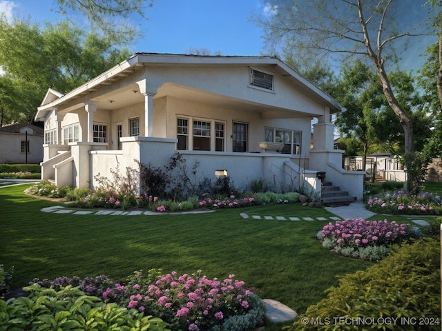 view of front facade with a front lawn