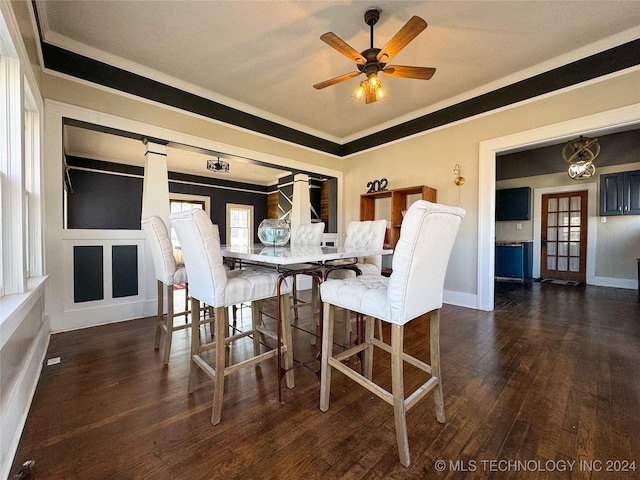 dining room featuring ceiling fan, dark hardwood / wood-style flooring, and ornamental molding