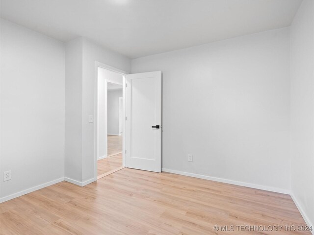 empty room featuring light wood-type flooring