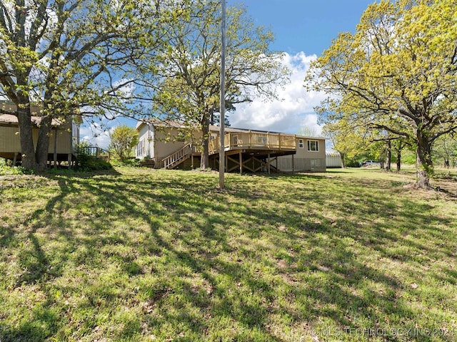 view of yard featuring a deck