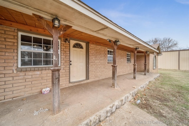 entrance to property with a porch