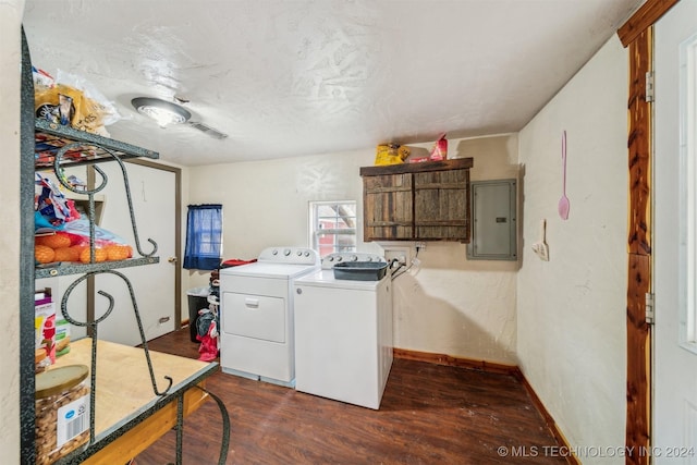 laundry room with washer and clothes dryer, dark hardwood / wood-style flooring, and electric panel