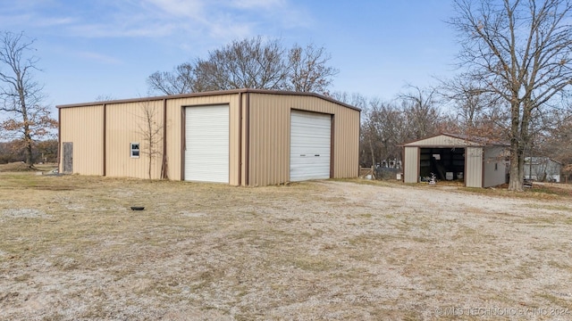 view of outdoor structure with a garage