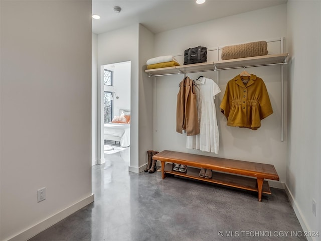 mudroom featuring concrete flooring