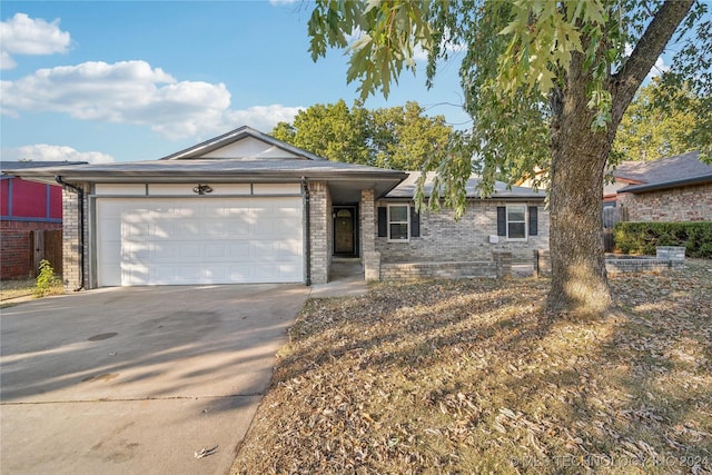 ranch-style house featuring a garage