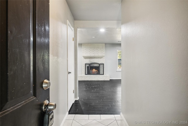 hallway with light hardwood / wood-style flooring