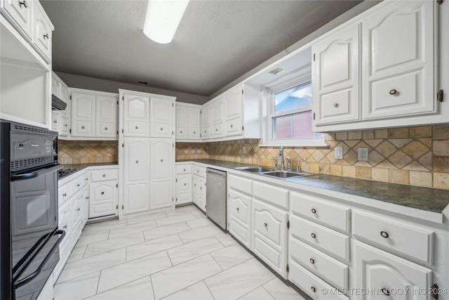 kitchen featuring white cabinets, dishwasher, decorative backsplash, and sink