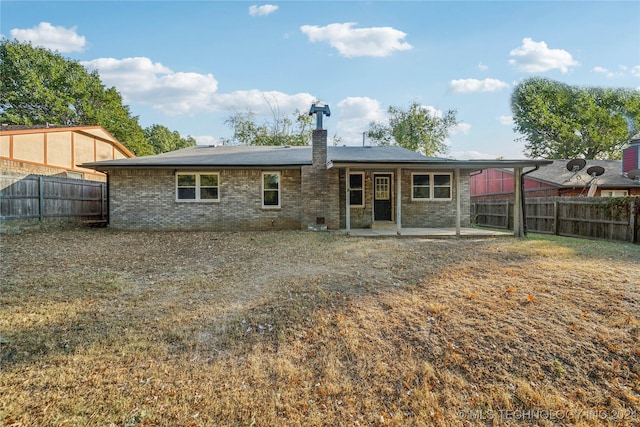 rear view of property with a patio area