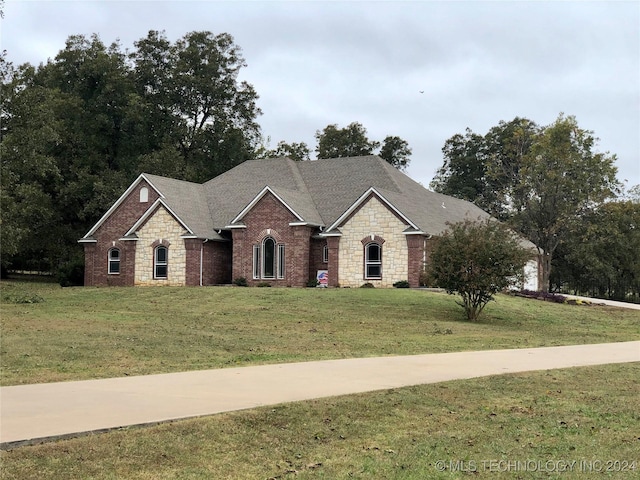 view of front of home with a front yard