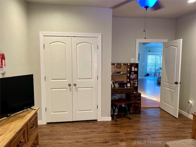 interior space with dark hardwood / wood-style flooring