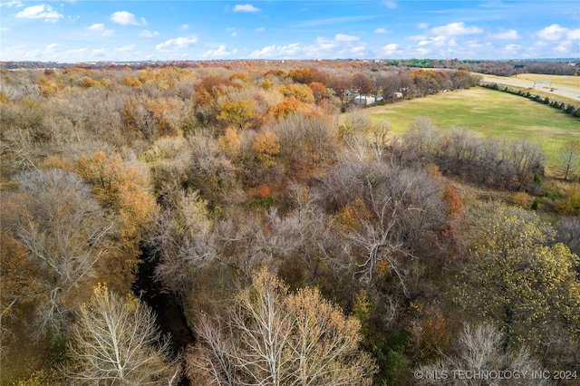 birds eye view of property with a rural view