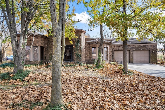 view of front of home with a garage