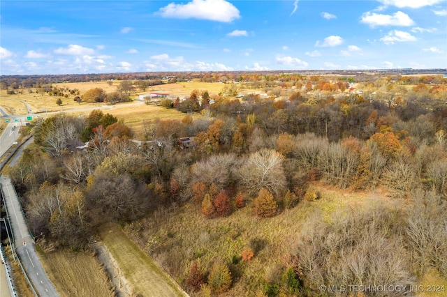 birds eye view of property featuring a rural view