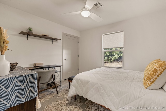 bedroom featuring hardwood / wood-style floors and ceiling fan