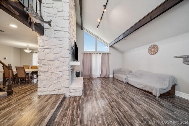 bedroom with beamed ceiling, high vaulted ceiling, dark hardwood / wood-style floors, and rail lighting