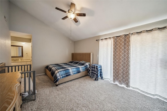 bedroom with carpet, ceiling fan, high vaulted ceiling, and connected bathroom