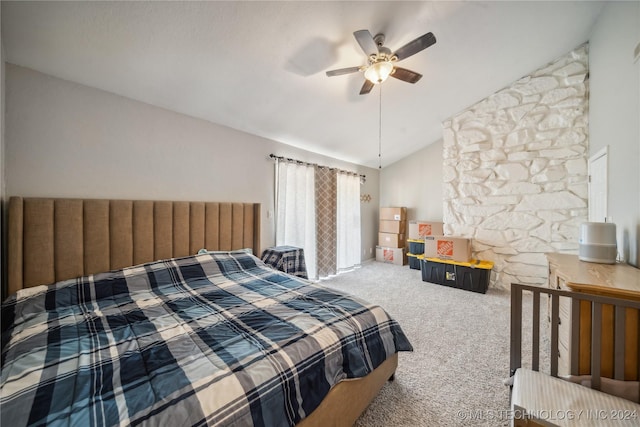 carpeted bedroom featuring ceiling fan and lofted ceiling