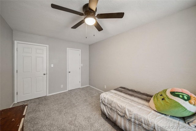 bedroom featuring carpet flooring and ceiling fan