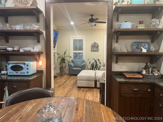 sitting room with ornamental molding, light hardwood / wood-style floors, and ceiling fan