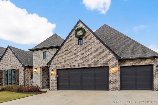 view of front of property with a garage