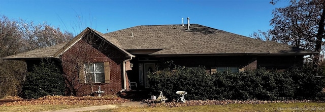 view of property exterior featuring a yard