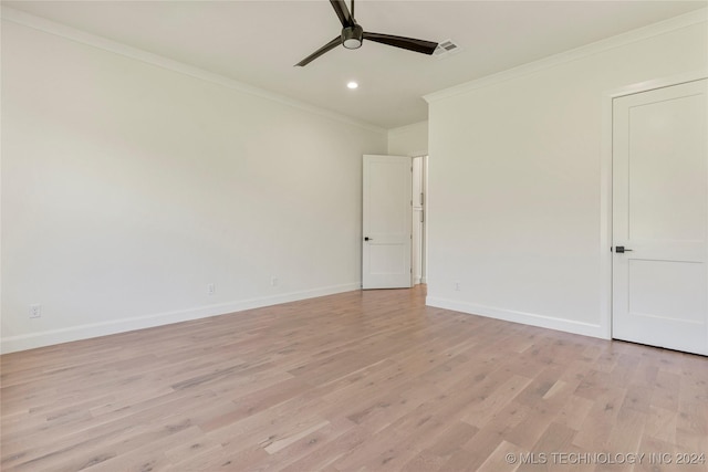 spare room with ceiling fan, light hardwood / wood-style floors, and crown molding